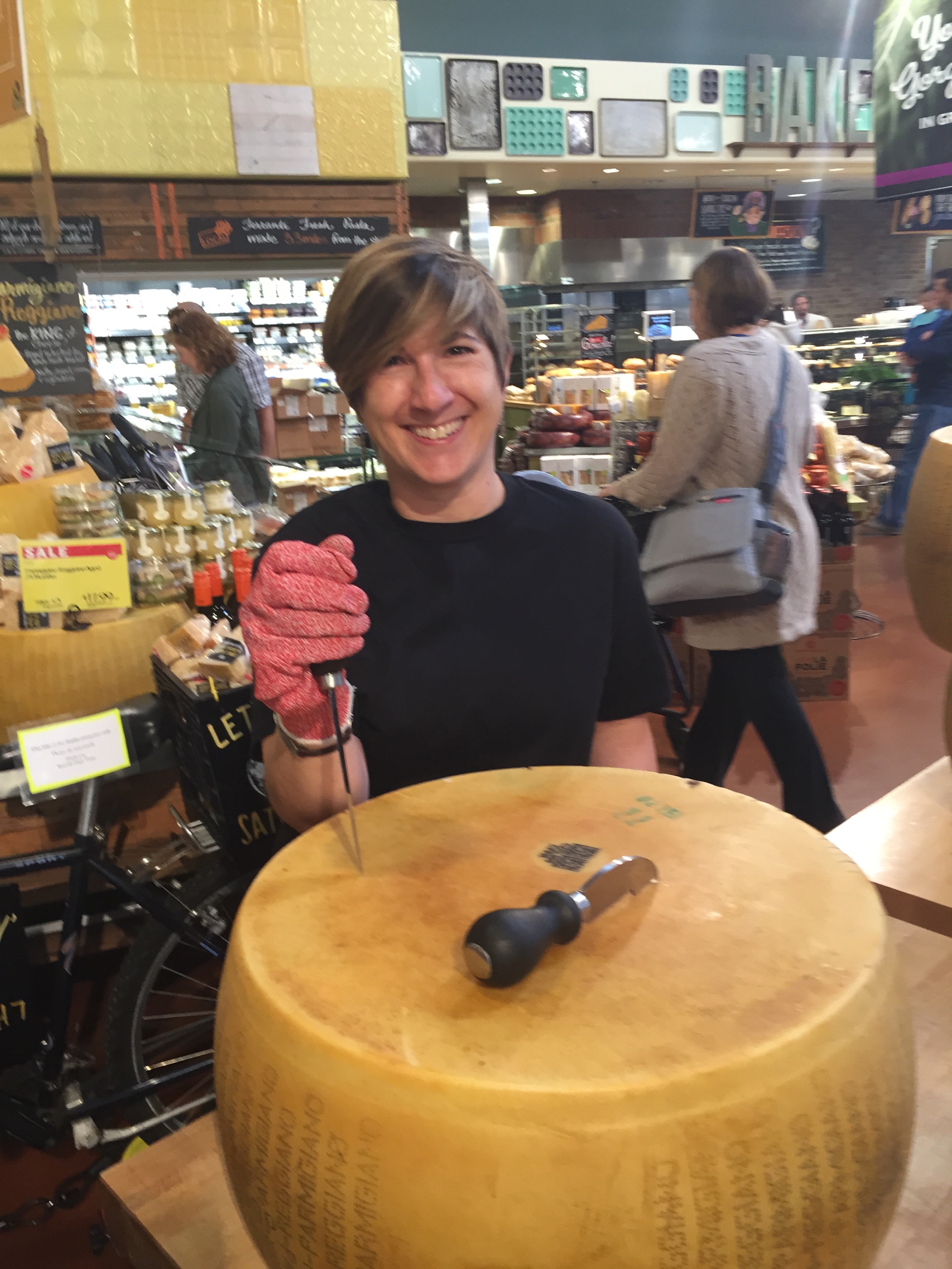 See the art of cracking a wheel of Parmigiano-Reggiano at Whole